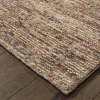 Brown and beige textured area rug with woven natural fiber appearance