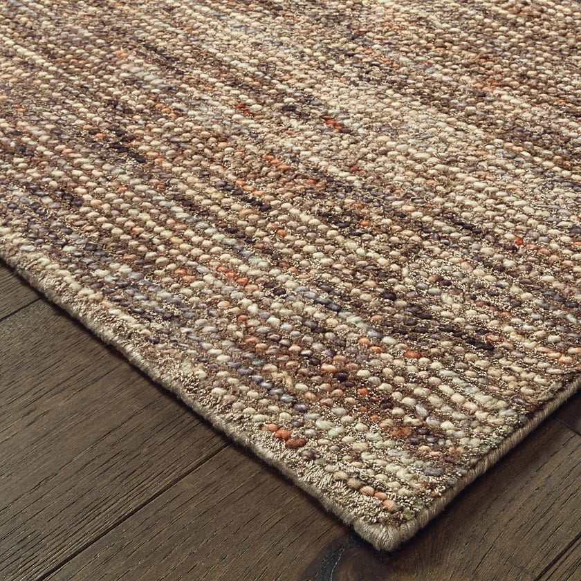Brown and beige textured area rug with woven natural fiber appearance