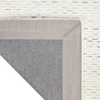 Cream textured area rug with subtle horizontal striping and natural woven pattern