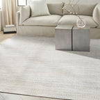 Cream textured area rug with subtle horizontal striping and natural woven pattern