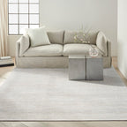 Cream textured area rug with subtle horizontal striping and natural woven pattern