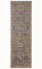 Gray traditional rug with floral pattern and ornate border in rust and gold tones
