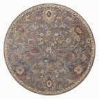 Gray traditional rug with floral pattern and ornate border in rust and gold tones