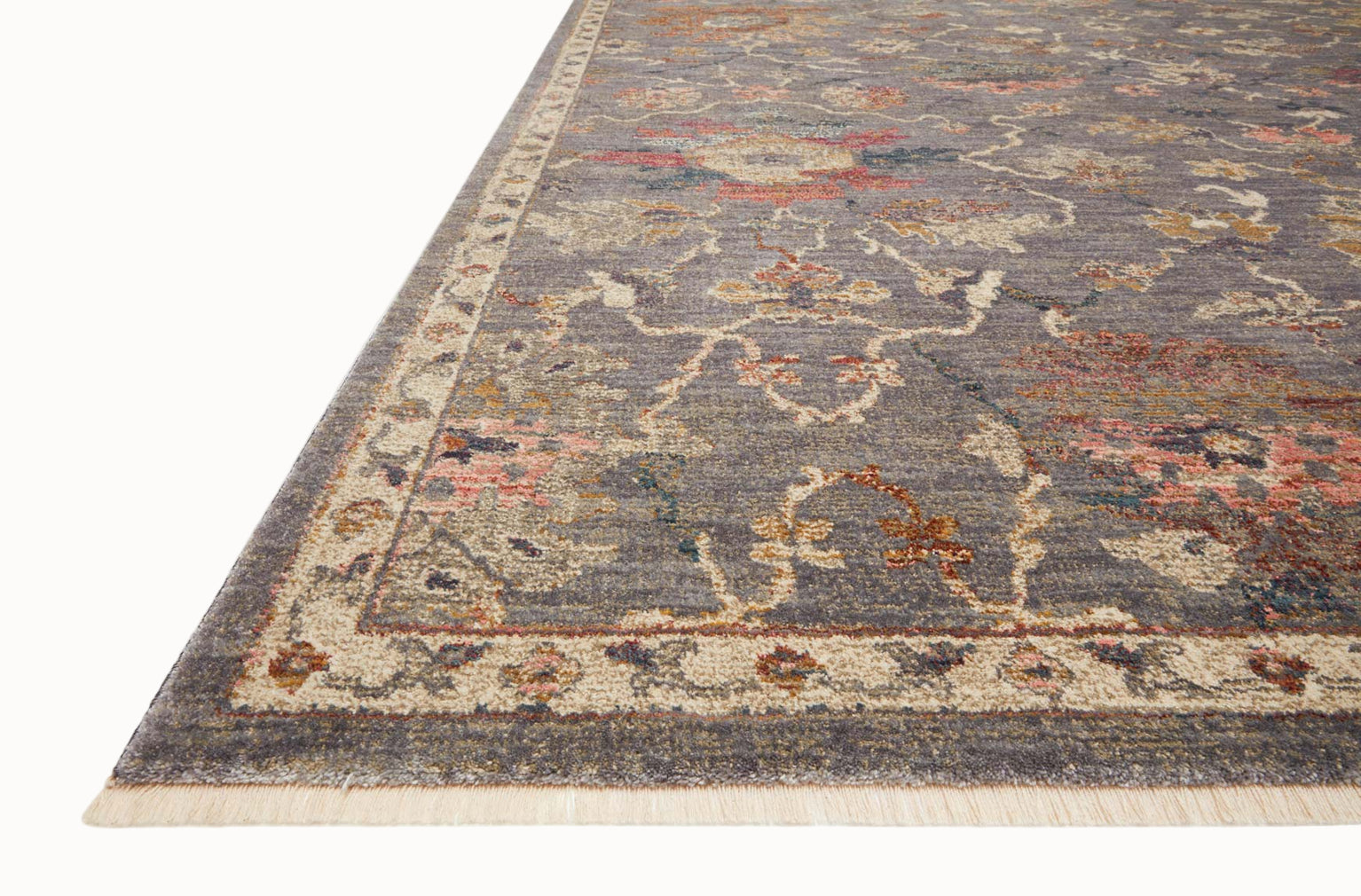 Gray traditional rug with floral pattern and ornate border in rust and gold tones