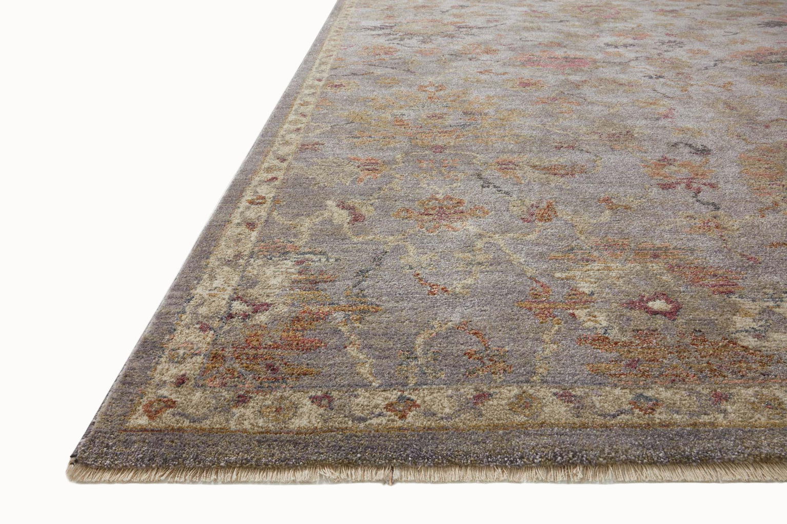 Gray traditional rug with floral pattern and ornate border in rust and gold tones