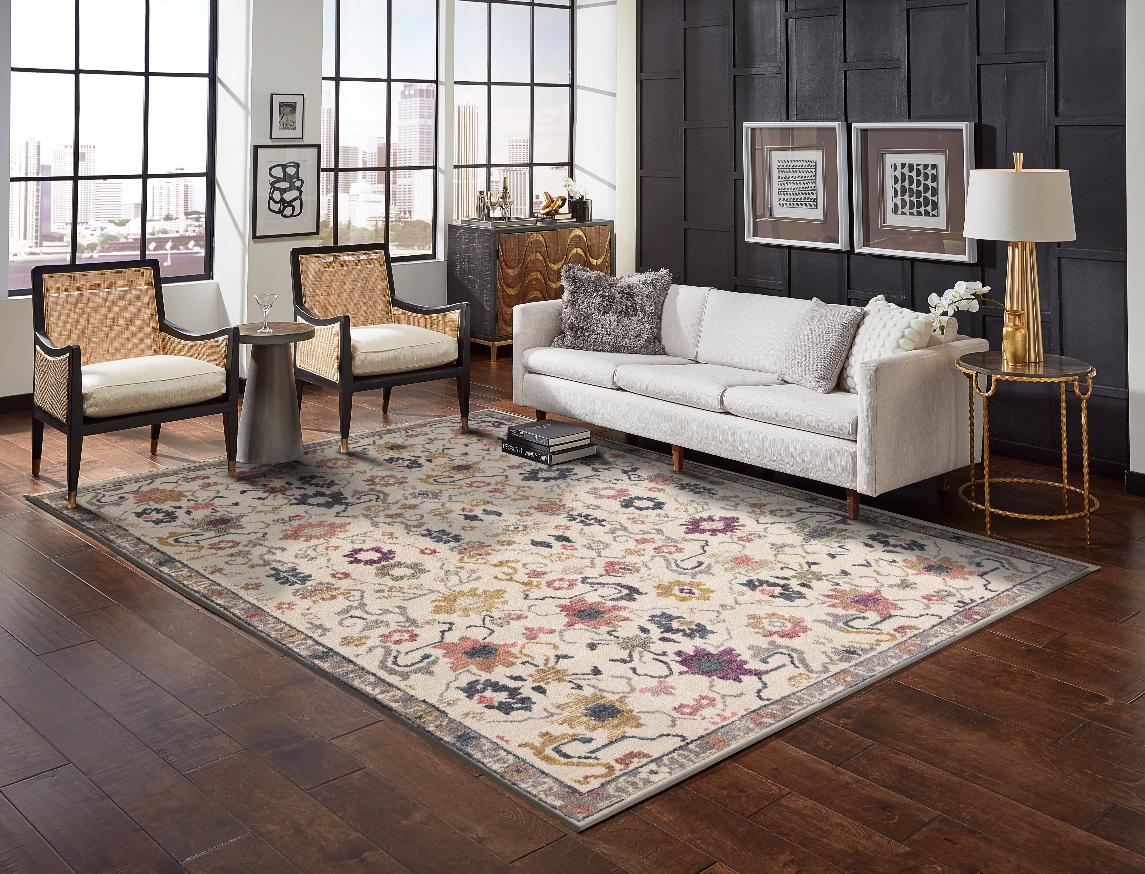 Cream wool rug with multicolored floral medallions and ornate border design
